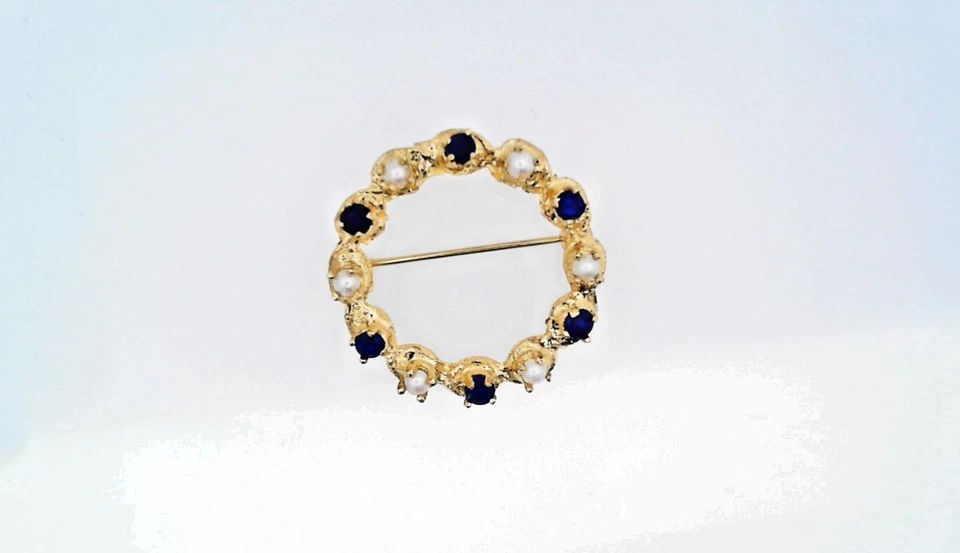 Prendedor de oro amarillo de 14kt para dama con zafiro azul y luna Foto 1 de 3