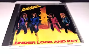 DOKKEN-UNDER LOCK AND KEY CD 1985-PRINTED IN USA - Imagen 1 de 3