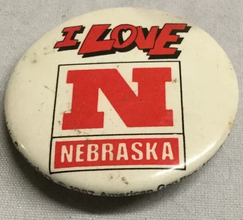 Vintage Nebraska Button Pin 1987 Athletic Supporters American Gag Bag Cover