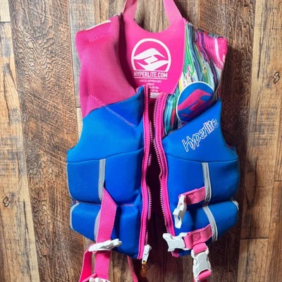 Hyperlite Child USCG Approved Life Vest 30-50 Lbs. Boating Safety Vest Pink Blue - Image 1 of 4