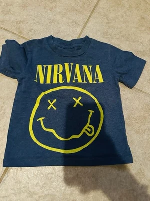 A navy blue t-shirt featuring the Nirvana smiley face logo. - Image 1 of 2
