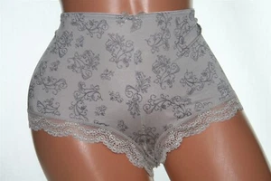 Panty corto gris para niño con patrón geométrico, bandas transparentes para las piernas y lazo brillante talla XL - Imagen 1 de 3