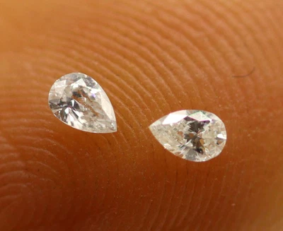 Par de diamantes naturales corte pera 0,07 TCW a juego 2 x 1 mm F/Si1 para pendientes Foto 1 de 4