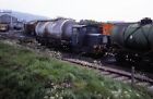 S708.  Ruston & Hornsby 4wDM amongst tankers - Original railway slide + rights