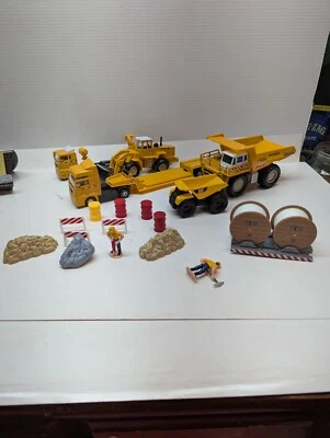 LOT OF 18 Construction Toys Trucks Men at Work Sign Rocks Steel Rolls Toy Set - Image 1 of 4