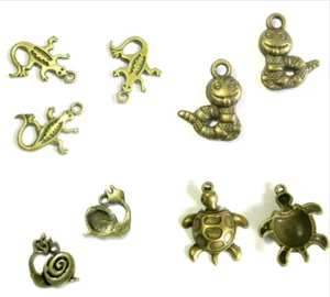 Anhänger Charms Bücherwurm Schnecke Schildkröte Salamander Gecko bronzefarben  - Bild 1 von 9