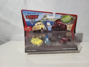 Disney Pixar Cars 2 Luigi y Guido Race Team con Tío Topolino Exclusivo - Imagen 1 de 2
