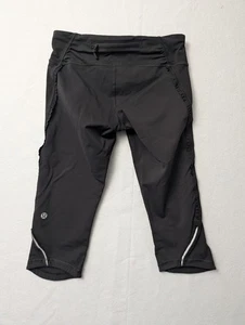 Lululemon kurze Leggings Damen 4 schwarz Run Fast Free Rüschen reflektierend Radlauf - Bild 1 von 8