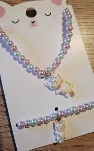 Parure collier et bracelet enfant perles rose tendre, nacré pendentif petit... - Imagen 1 de 2