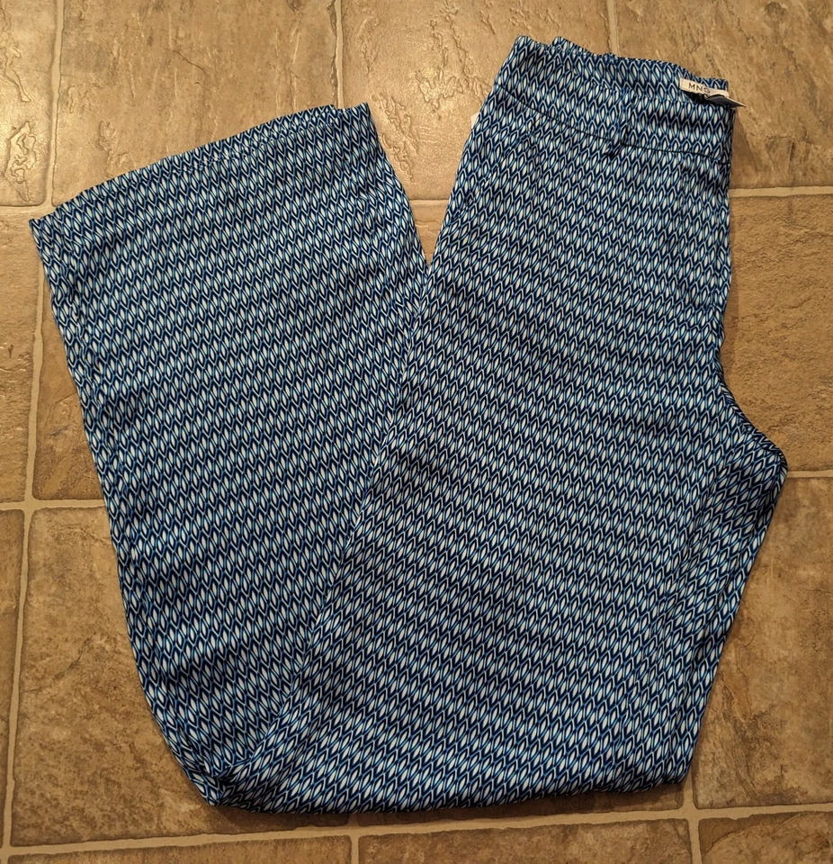 Pantalones semi transparentes 1976 nuevos con etiquetas MNG By Mango talla 4 100 % poliéster azul estampado diamante Foto 1 de 4