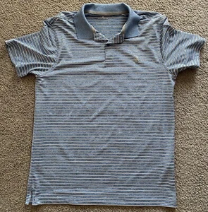 Camisa polo de golf Izod para hombre con rayas azules elásticas talla S/P. lote Z30 - Imagen 1 de 4