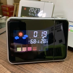 Electronic Home Clock, Displays Time, Day, and Temperature, 5.83 × 2.05 × 4.13in - Picture 1 of 2