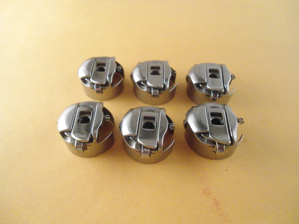 6 Pigtail Bobbin Case Xc7206001 541678 for Babylock Emp6