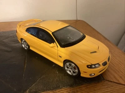 1:18 Scale 2005 Pontiac GTO Yellow Jacket GMP READ - Image 1 of 4