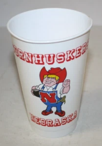 1980 NEBRASKA CORNHUSKER HUSKERS ESTADIO CONMEMORATIVO CALENDARIO TAZA HERBIE COCA COLA - Imagen 1 de 2