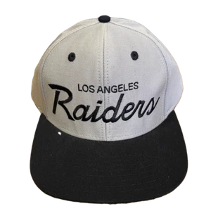Cappello Reebok Los Angeles Raiders con visiera piatta bianco e nero NFL - Foto 1 di 3