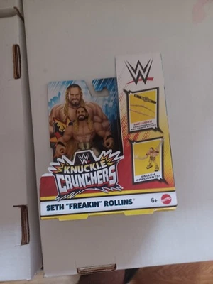  WWE MATTEL KNUCKLE CRUNCHERS SERIE 8 SETH ROLLINS CON TÍTULO DE PESO PESADO Foto 1 de 2