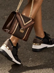 Michael KORS LIV ICONIC BLACK BROWN MK GOLD LOGO WEDGE SNEAKERS I LOVE SHOES - Picture 1 of 9