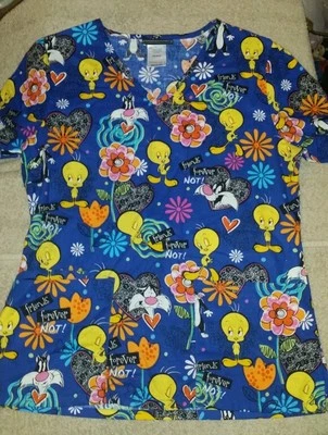 Woman's X-small Looney Tunes v-neck multi-color scrub Top shirt XS Tweetie Bird - Image 1 of 4