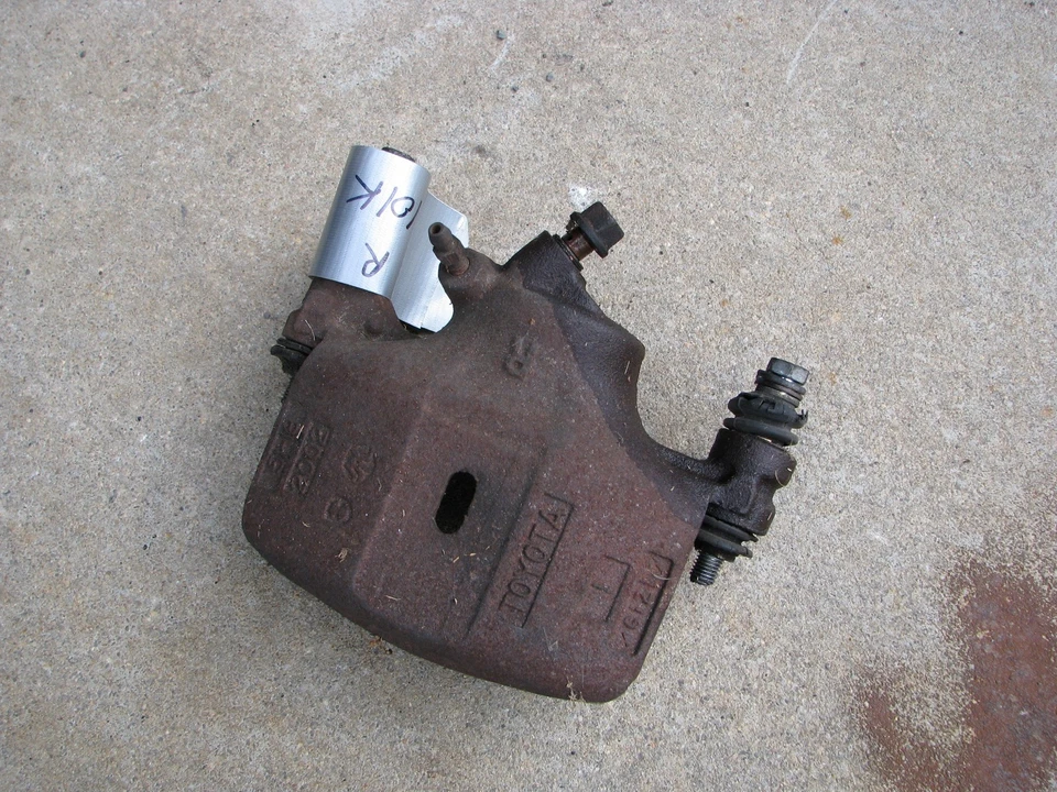 Pinza de freno delantera derecha Toyota MR2 MK1 85-86 OEM buena usada 101 k Foto 1 de 1