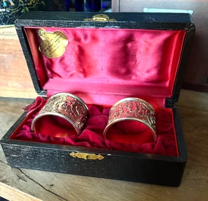 Corbell & Co. Quadruple Silver Plate Repoussé Napkin Ring Pair in Box Cherubs - Picture 1 of 11