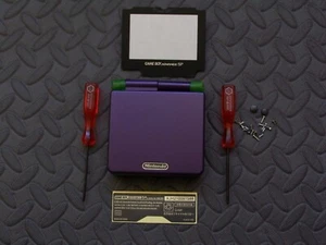  Carcasa de repuesto GBA SP púrpura + medio verde transparente - Imagen 1 de 3