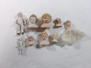 Konvolut 7 alte Puppenköpfe Keramik & Porzellan plus Mini 2 Puppen - Bild 1 von 8
