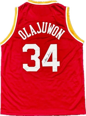 Hakeem Olajuwon Signed Autographed Red Jersey JSA Authenticated - Image 1 of 3
