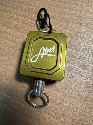 Carretes Abel Zinger Olive Foto 1 de 4