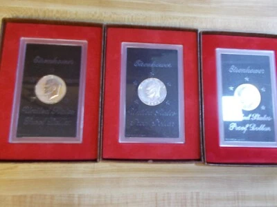 1972,1973,1974 Lot Of 3 Proof Eisenhower Dollars with 4 extra empty boxes - Image 1 of 4