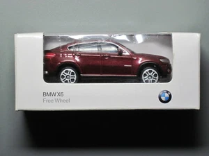 Org. Free Wheel Modell - BMW X6 E71 - weinrot-Metallic - Maßstab 1:64 - NEU - Bild 1 von 9