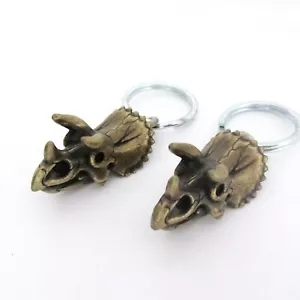 Sale Item - Set of Two Triceratops Skull Keychains with Brass Finish - Picture 1 of 2