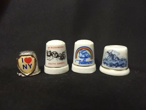 Lote de 4 dedales de porcelana y estaño Baltimore Nueva York Mt Rushmore molino de viento azul - Imagen 1 de 6