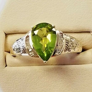 Grüner Brillantschliff Peridot mit 0,28TCW ganz natürlichem Diamanten in 10K Gelbgold  - Bild 1 von 2
