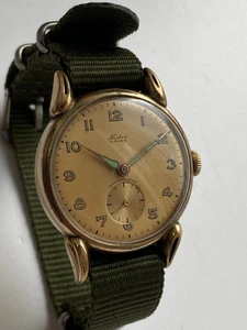 RELOJ HOMBRE NOSTRA DOBLE CHAPADO EN ORO VINTAGE RARO AU 20 MICRAS SEGUNDA GUERRA MUNDIAL MILITAR 15 - Imagen 1 de 14