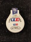 Pin's Jeux Olympiques LilleHammer 94 TF1