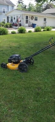 21-inch poulan pro push lawn mower with grass catcher yellow color Pick up only - Image 1 of 4