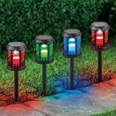 Juego de 4 linternas de vela que cambian de color con energía solar luces de camino de jardín Foto 1 de 3