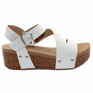 white volatile sandals