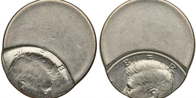 Mint Error. (ND) Kennedy (40% Silver, 1965-70) Half Dollar 60% Struck Off-Center - Image 1 of 4