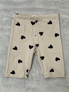 H&M Girls Bike Shorts Size 7 – Beige with Black Hearts - Picture 1 of 5