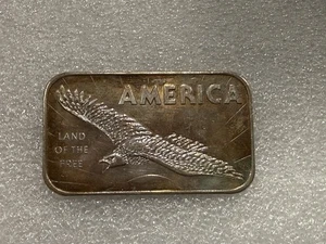 Silver Art Bar America Land of the Free American Argent Mint 1 oz .999 Toned (A) - Picture 1 of 2