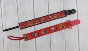 49ers Schnullerclip, Fußball Schnullerclip, Baby Dusche Geschenk, Strumpfhalter - Bild 1 von 7