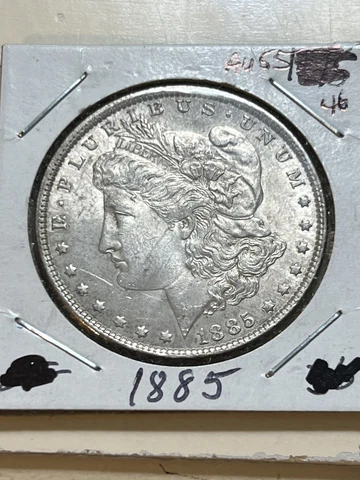 1885-P  Morgan Silver Dollar —  AU/BU Slider  with Natural Toning Cover