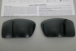 Lente de repuesto Oakley GASCAN POLARIZADA IRIDIO NEGRA AUTÉNTICA NUEVA CON ETIQUETAS - Imagen 1 de 4