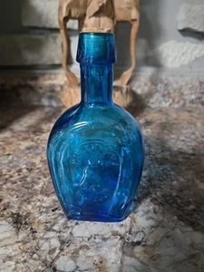 VINTAGE BLUE HORSESHOE GLASS BOTTLE 6.5" COLLECTIBLE - Picture 1 of 2
