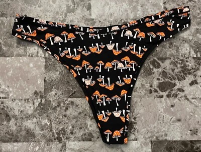 VICTORIA'S SECRET PINK WHITE POLKA DOT ORANGE BLACK MUSHROOM THONG PANTIES - Image 1 of 3