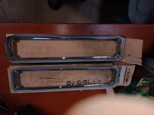 NOS 1974-1975 BUICK CENTURY/REGAL Wagons PAIR  2 PIECES TAIL LAMP BEZELS 5946373 - Picture 1 of 3