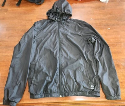 Chaqueta cortavientos con capucha nómada cremallera completa negra manga larga O'Neill para hombre pequeña Foto 1 de 4