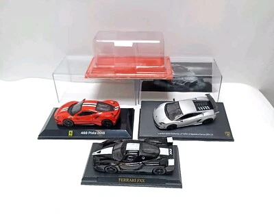 Lotto Di 3 Modellini Auto FERRARI FXX, 488 PISTA, LAMBORGHINI SQUADRA CORSE 1:43 - Immagine 1 di 4